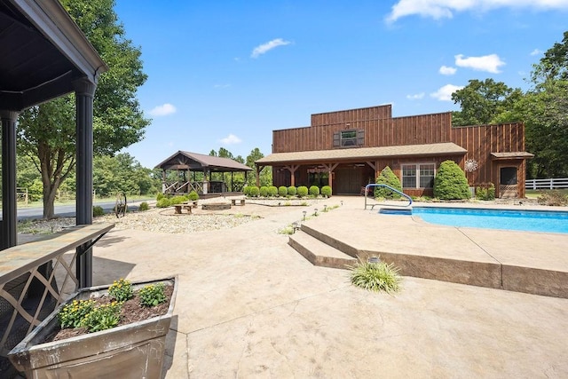 19537 Eastfork Ln, Gravette, AR 72736 - swimming pool featuring a gazebo and a patio area