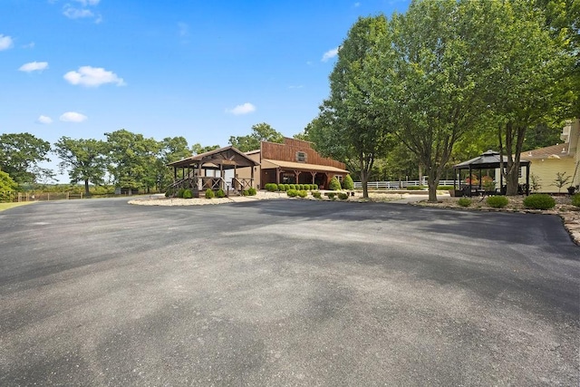 19537 Eastfork Ln, Gravette, AR 72736 - view of front of home with a gazebo and driveway
