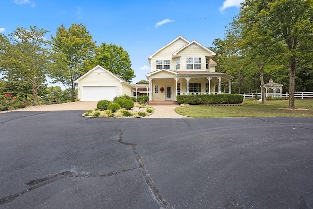 19537 Eastfork Ln, Gravette, AR 72736 - view of front of property featuring covered porch, driveway, and a gazebo