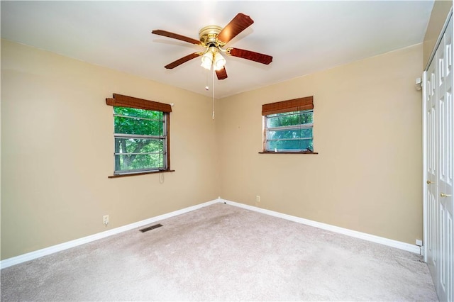 585 County Road 217, Berryville, AR 72616 - carpeted spare room featuring baseboards and ceiling fan