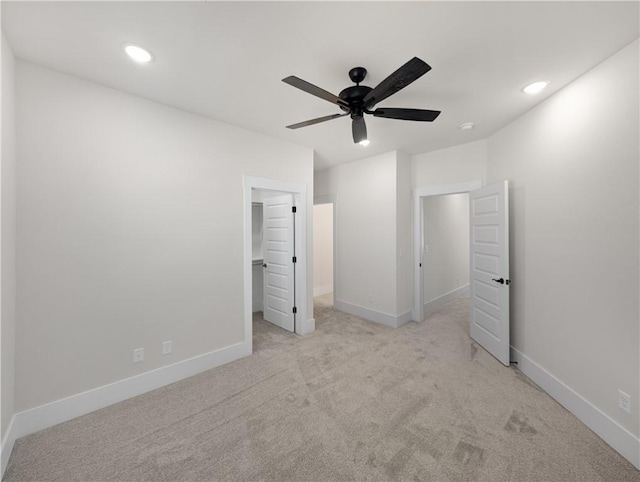1821 Bluestem Dr, Centerton, AR 72719 - unfurnished bedroom featuring carpet, a spacious closet, baseboards, a ceiling fan, and recessed lighting