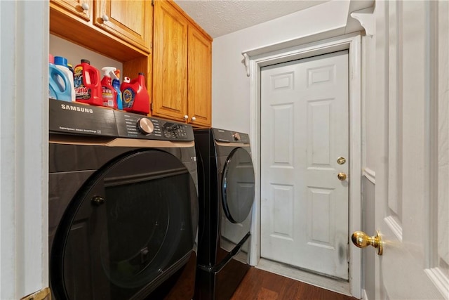 4 Hillcrest Dr, Holiday Island, AR 72631 - laundry room featuring cabinet space, separate washer and dryer, dark wood-style floors, and a textured ceiling