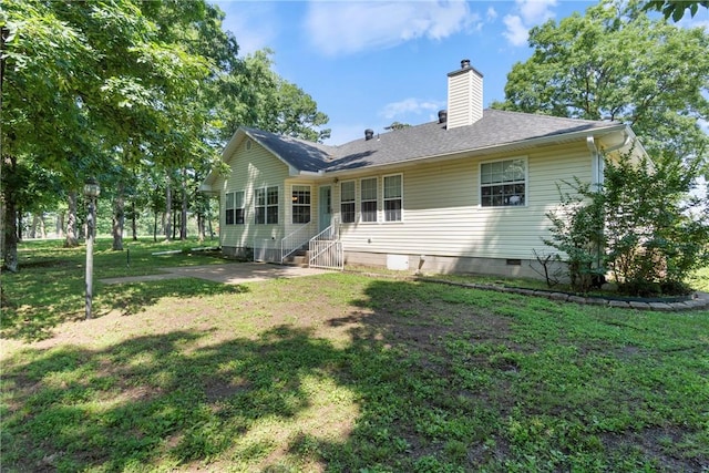 4 Hillcrest Dr, Holiday Island, AR 72631 - back of house with crawl space, a chimney, a yard, a shingled roof, and entry steps