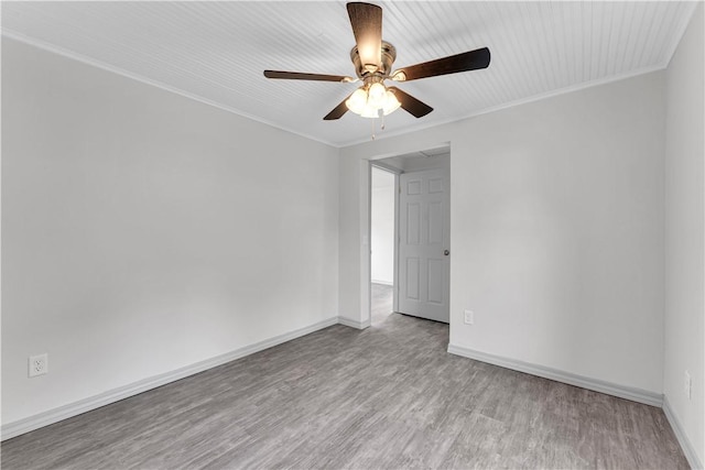 404 Hargis St, Huntsville, AR 72740 - spare room with wood finished floors, ceiling fan, and ornamental molding