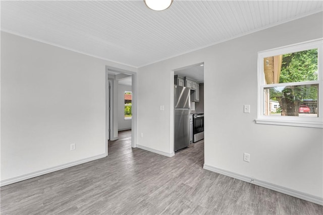404 Hargis St, Huntsville, AR 72740 - unfurnished room featuring wood finished floors and crown molding