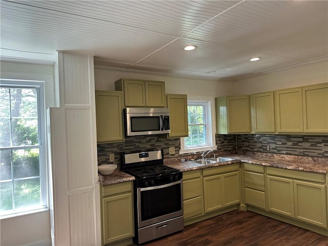 301 W Bean St, Lincoln, AR 72744 - kitchen with stainless steel appliances, a sink, backsplash, dark wood-type flooring, and ornamental molding