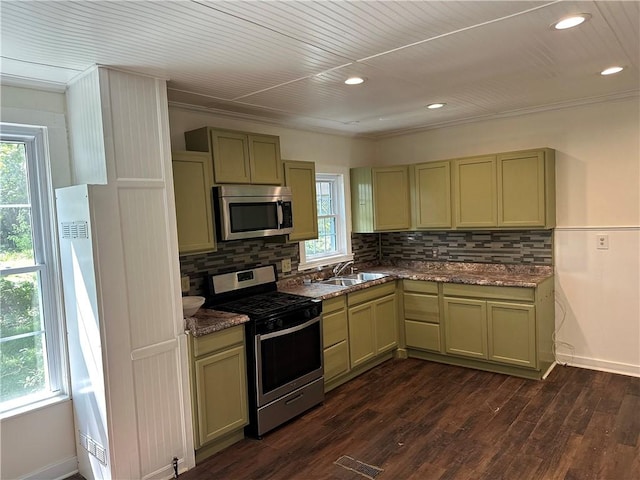 301 W Bean St, Lincoln, AR 72744 - kitchen with appliances with stainless steel finishes, a sink, backsplash, dark wood-type flooring, and recessed lighting