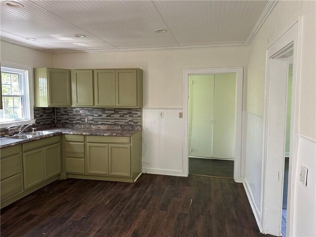301 W Bean St, Lincoln, AR 72744 - kitchen featuring a sink, dark wood-style floors, decorative backsplash, and crown molding