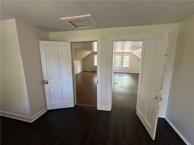 301 W Bean St, Lincoln, AR 72744 - hallway with dark wood-type flooring, baseboards, attic access, and vaulted ceiling