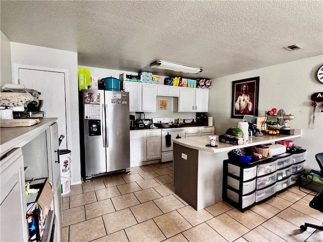 1297 Homestead Loop, Springdale, AR 72764 - kitchen featuring stainless steel refrigerator with ice dispenser, electric stove, a peninsula, light tile patterned floors, and white cabinetry