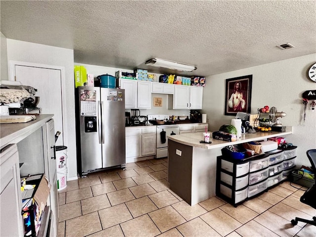 1297 Homestead Loop, Springdale, AR 72764 - kitchen with stainless steel refrigerator with ice dispenser, white electric range oven, a peninsula, light tile patterned floors, and white cabinets
