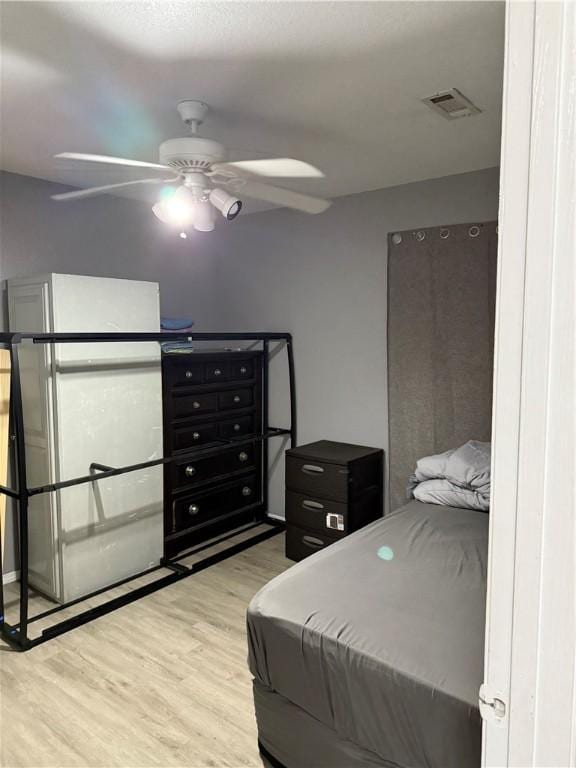 1269 E Homestead Loop, Springdale, AR 72764 - bedroom featuring light wood-style floors and a ceiling fan