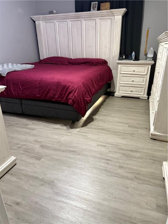 1269 E Homestead Loop, Springdale, AR 72764 - bedroom featuring light wood-style flooring