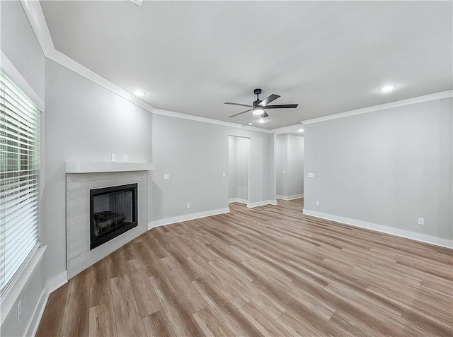 9 Sheidaig Ln, Bella Vista, AR 72715 - unfurnished living room with ceiling fan, crown molding, a fireplace, light wood-type flooring, and recessed lighting
