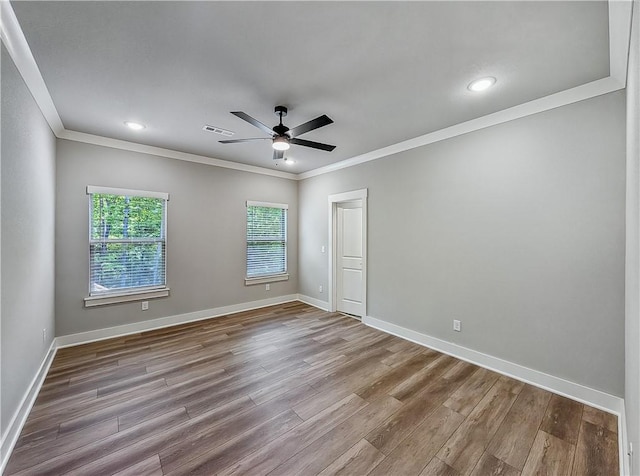 9 Sheidaig Ln, Bella Vista, AR 72715 - empty room featuring ornamental molding, wood finished floors, ceiling fan, and recessed lighting