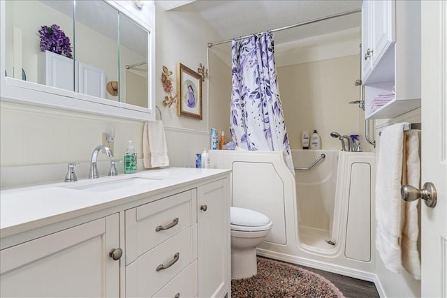 1900 76th Hwy, Anderson, MO 64831 - full bath with vanity, shower / bath combination with curtain, and wood finished floors