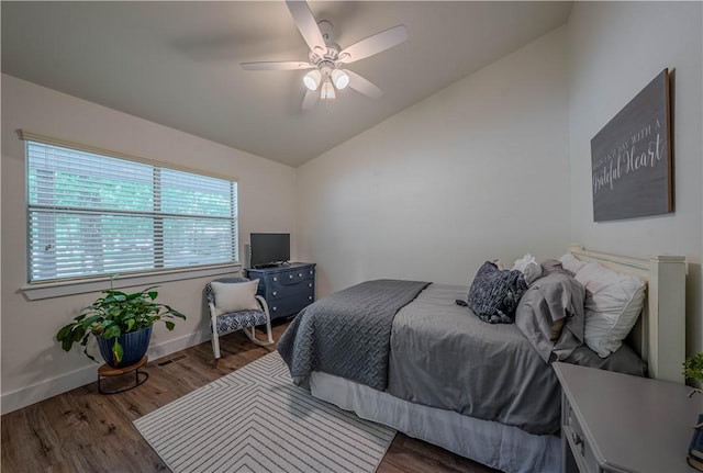 6 Muker Ln, Bella Vista, AR 72714 - bedroom with lofted ceiling, wood finished floors, baseboards, and a ceiling fan