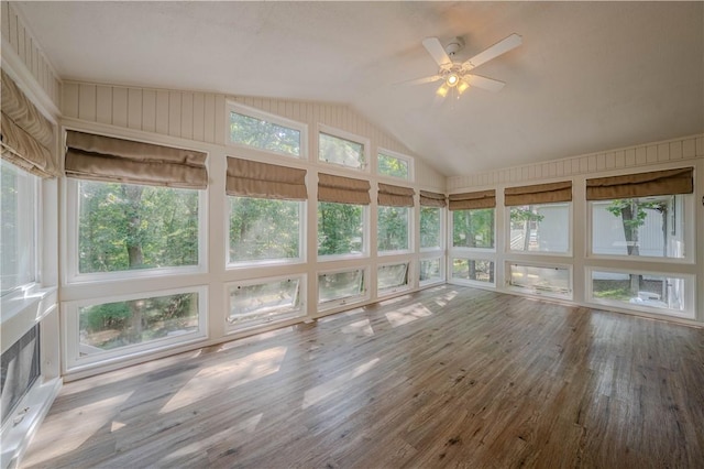 6 Muker Ln, Bella Vista, AR 72714 - unfurnished sunroom featuring lofted ceiling and wood finished floors