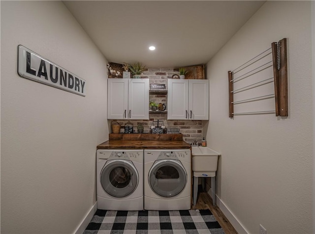 6 Muker Ln, Bella Vista, AR 72714 - laundry room with cabinet space, washing machine and dryer, baseboards, and recessed lighting