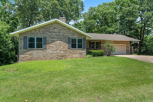 10 Magrath Ln, Bella Vista, AR 72715 - view of front of property with a chimney, an attached garage, brick siding, a front lawn, and driveway