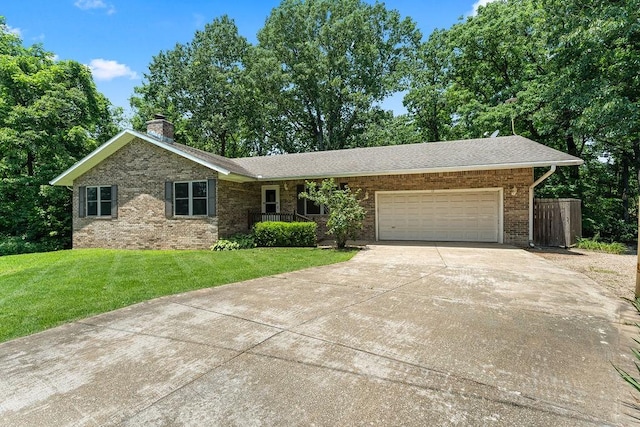 10 Magrath Ln, Bella Vista, AR 72715 - ranch-style house featuring an attached garage, a front lawn, concrete driveway, a chimney, and brick siding