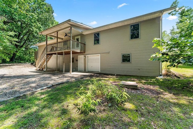 10 Magrath Ln, Bella Vista, AR 72715 - rear view of property with ceiling fan, stairs, and a wooden deck