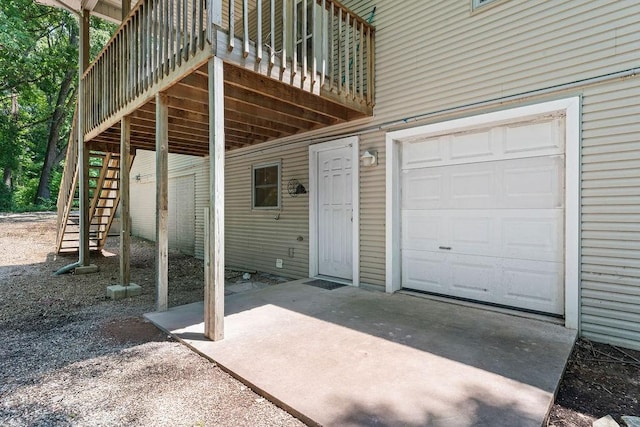 10 Magrath Ln, Bella Vista, AR 72715 - doorway to property with a garage