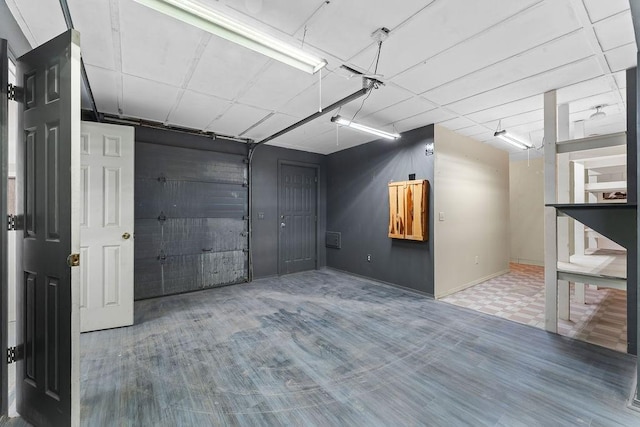 10 Magrath Ln, Bella Vista, AR 72715 - garage featuring baseboards