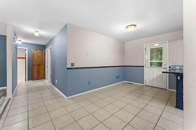 10 Magrath Ln, Bella Vista, AR 72715 - spare room with baseboards and light tile patterned floors