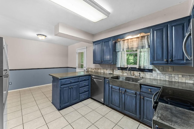 10 Magrath Ln, Bella Vista, AR 72715 - kitchen with appliances with stainless steel finishes, blue cabinets, and a sink