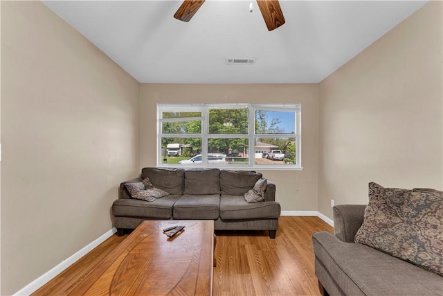 802 Buford St, Springdale, AR 72762 - living area featuring a ceiling fan, light wood-type flooring, and baseboards