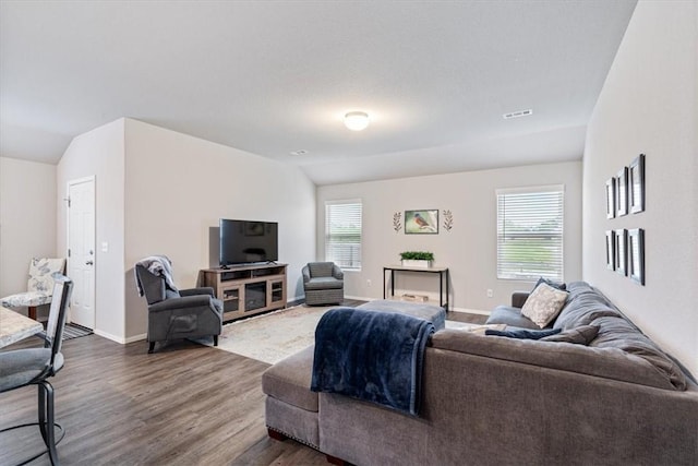 2213 E Fennec St, Siloam Springs, AR 72761 - living area with healthy amount of natural light, wood finished floors, and baseboards
