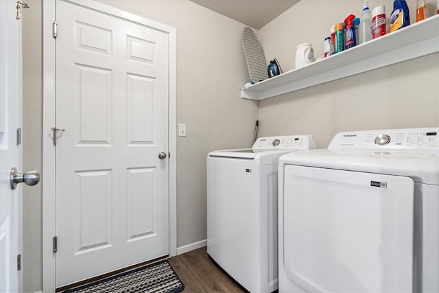 2213 E Fennec St, Siloam Springs, AR 72761 - washroom with washer and clothes dryer, dark wood-type flooring, and baseboards