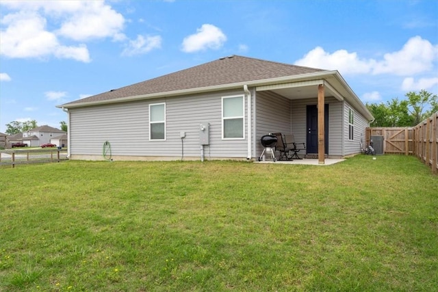 2213 E Fennec St, Siloam Springs, AR 72761 - rear view of house with central air condition unit, a patio, and a gate