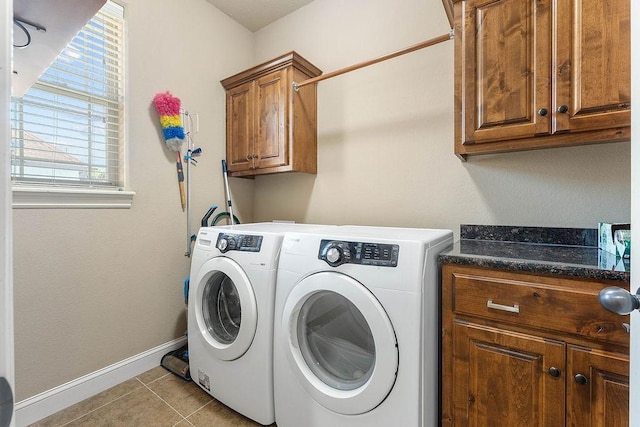 5703 S 66th St, Cave Springs, AR 72718 - washroom featuring cabinet space, washer and clothes dryer, and light tile patterned floors