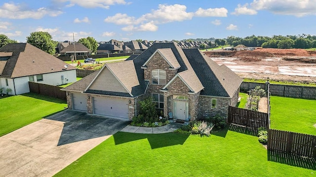 5703 S 66th St, Cave Springs, AR 72718 - view of front facade featuring stone siding, an attached garage, concrete driveway, a fenced backyard, and a residential view