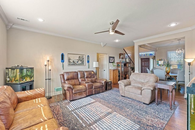5703 S 66th St, Cave Springs, AR 72718 - living area featuring wood finished floors, ceiling fan, ornamental molding, a chandelier, and recessed lighting