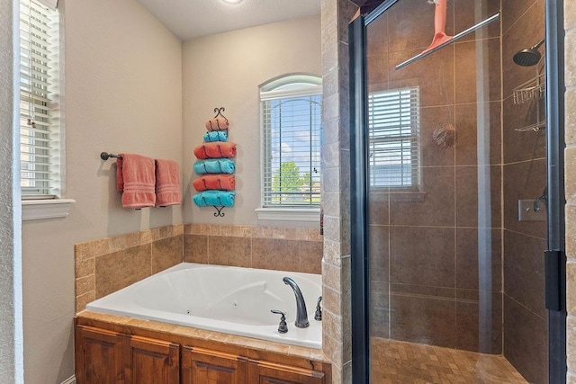 5703 S 66th St, Cave Springs, AR 72718 - bathroom featuring a tub with jets and a stall shower