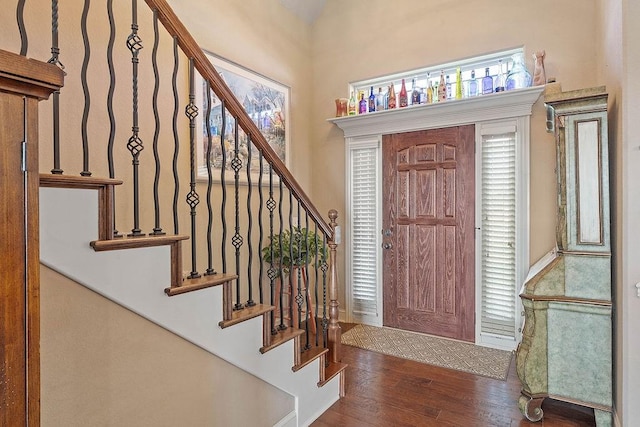 5703 S 66th St, Cave Springs, AR 72718 - foyer entrance featuring wood finished floors and stairway