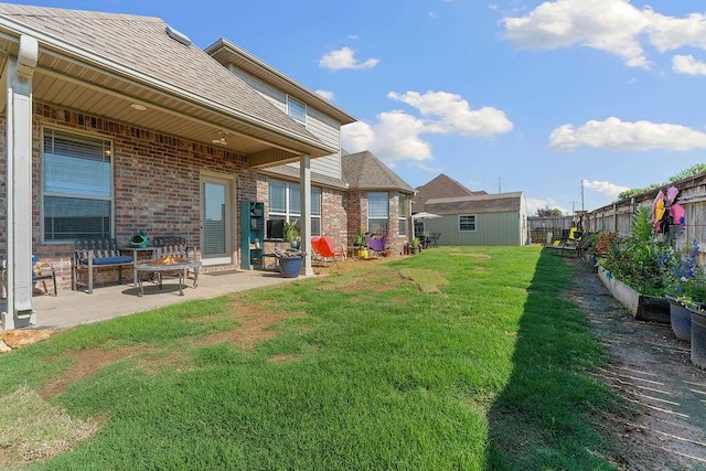5703 S 66th St, Cave Springs, AR 72718 - fenced yard with a patio and an outbuilding