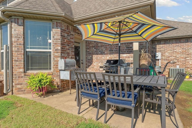 5703 S 66th St, Cave Springs, AR 72718 - view of patio / terrace featuring exterior kitchen and outdoor dining space
