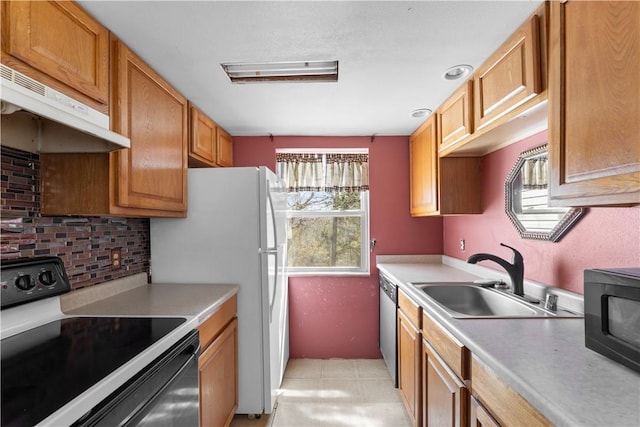 11021 Lathams Landing Rd, Garfield, AR 72732 - kitchen with black appliances, a sink, backsplash, under cabinet range hood, and light countertops