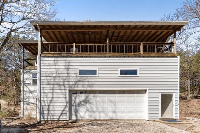 11021 Lathams Landing Rd, Garfield, AR 72732 - view of side of property featuring dirt driveway and an attached garage