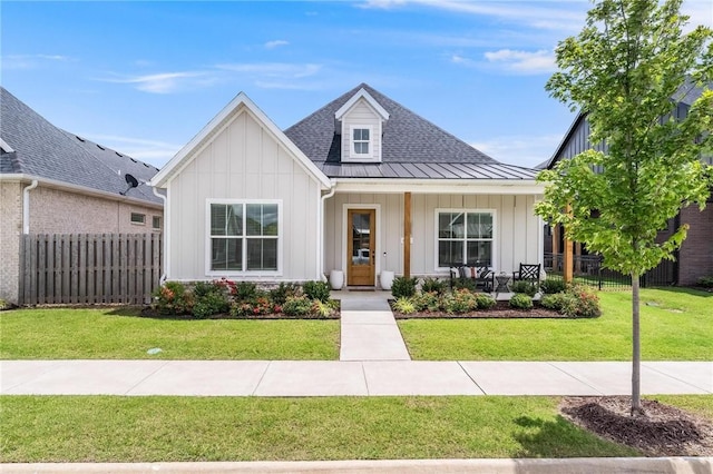 6741 Garden Trail Ave, Springdale, AR 72762 - view of front facade featuring board and batten siding, a standing seam roof, a porch, and a metal roof