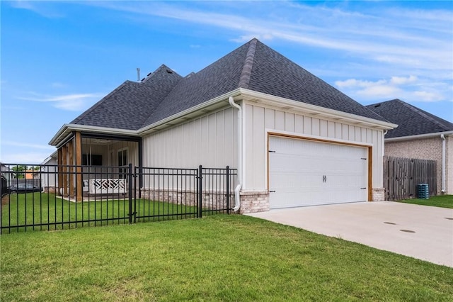 6741 Garden Trail Ave, Springdale, AR 72762 - view of side of home with a shingled roof, driveway, and an attached garage