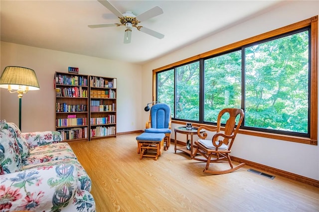 19 Bobwhite Ln, Holiday Island, AR 72631 - sitting room with wood finished floors and a ceiling fan