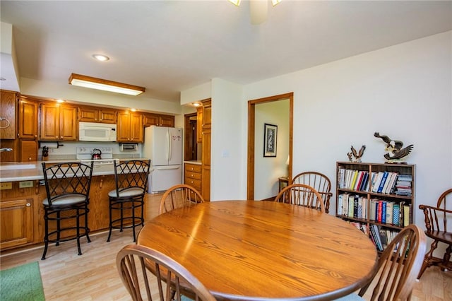 19 Bobwhite Ln, Holiday Island, AR 72631 - dining area with light wood-style floors and recessed lighting