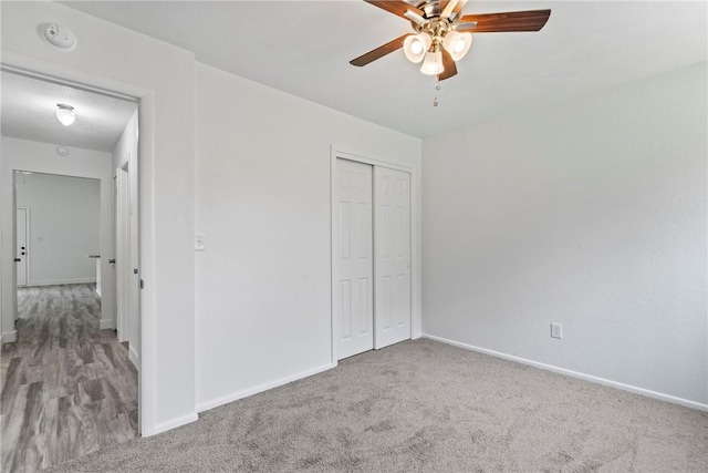 308 Kane St, Siloam Springs, AR 72761 - unfurnished bedroom featuring carpet flooring, a closet, and ceiling fan