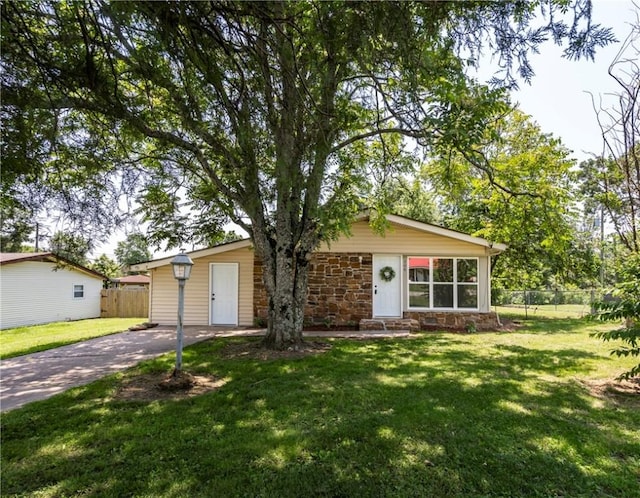 308 Kane St, Siloam Springs, AR 72761 - view of front facade with driveway and stone siding