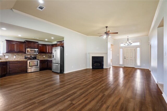 1232 Big Oak Dr, Alma, AR 72921 - unfurnished living room featuring a ceiling fan, dark wood finished floors, a chandelier, a fireplace, and ornamental molding